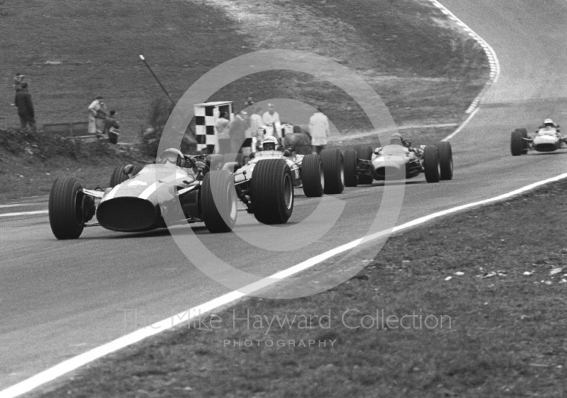 Pedro Rodriguez, Cooper Maserati T81 V12, leads Ludovico Scarfiotti, Ferrari 312 and Jack Brabham Repco, Brabham, BT20,&nbsp;enters Druids Hairpin, Brands Hatch, Race of Champions 1967.
