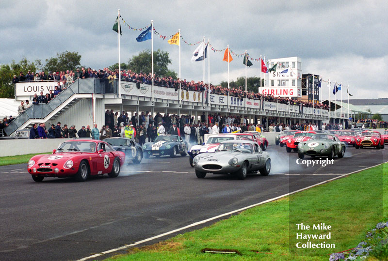 Derek Bell/Peter Hardman, Ferrari 330 LM/B, leaves the grid alongside Nigel Corner, lightweight Jaguar E-type, RAC TT, Goodwood Revival, 1999.
