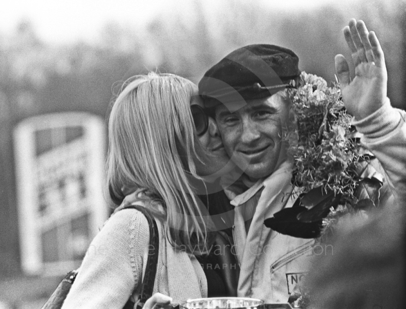 Jackie Stewart gets a kiss from his wife, Helen, after winning the Formula One Race of Champions, Brands Hatch, 1970
