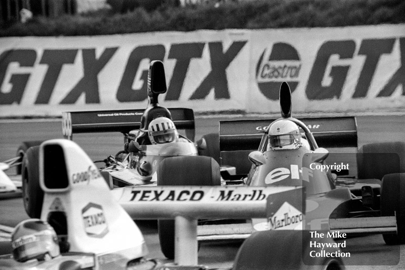 Jody Scheckter, Tyrrell 007, and Tom Pryce, Shadow DN5, follow Emerson Fittipaldi, McLaren M23,&nbsp;at the 1975 Race of Champions, Brands Hatch.
