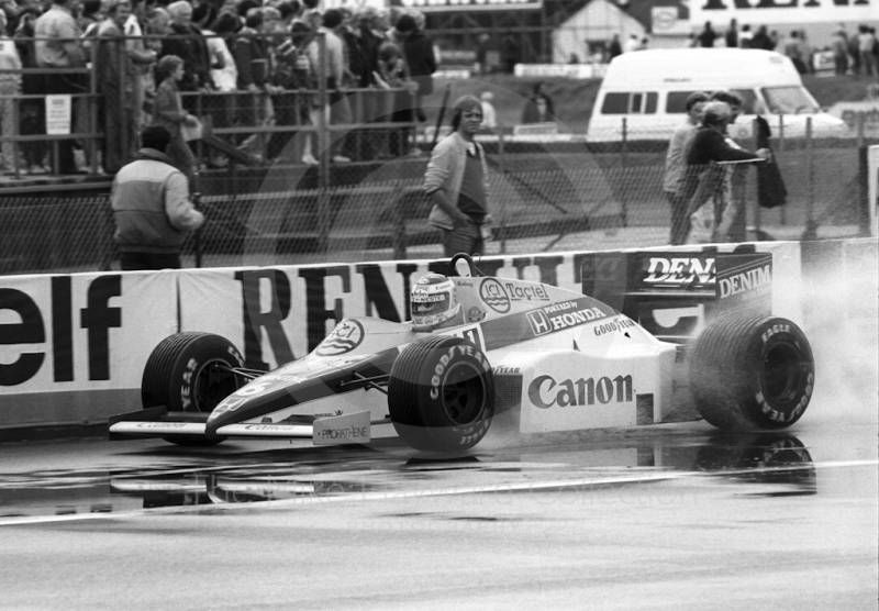 Keke Rosberg, Williams FW10, goes into the pits during practice for the 1985 British Grand Prix at Silverstone.
