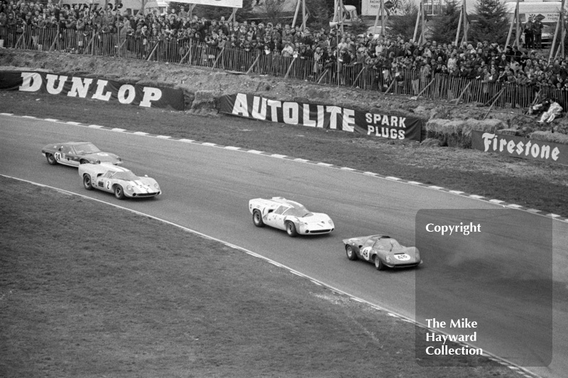 First lap at Paddock Hill bend, BOAC 500, Brands Hatch, 1968. From the front, the cars and drivers are as folllows.<br />
<br />
<span style="line-height: 1.6em;">48 - Tony Dean/Mike Beckwith, Ferrari Dino 206 S<br />
<span style="line-height: 1.6em;">1 &nbsp; - Dave Charlton/Craig Fisher, Lola T70 MK.3<br />
<span style="line-height: 1.6em;">2 &nbsp; - Jo Bonnier/Sten Axelsson Lola T70 MK.3<br />
<span style="line-height: 1.6em;">24 - Jackie Oliver/John Miles, Lotus 47<span style="line-height: 1.6em;">&nbsp;
