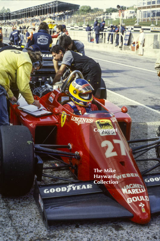 Michele Alboreto, Ferrari 156/85, in the pits at Brands Hatch, 1985 European Grand Prix.
