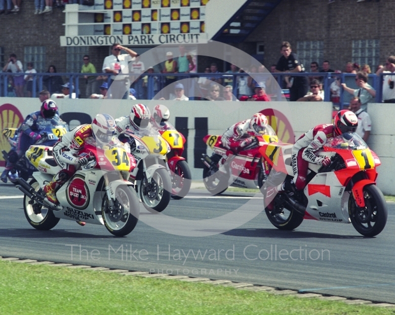 Wayne Rainey, Marlboro Team Roberts Yamaha, leads Kevin Schwantz, Team Lucky Strike Suzuki, off the line, Donington Park, British Grand Prix 1991.