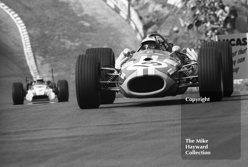 Silvio Moser, Charles Vogele Racing Team Brabham Repco BT20, followed by John Surtees, Honda RA301, at Druids Hairpin, Brands Hatch, 1968 British Grand Prix.
