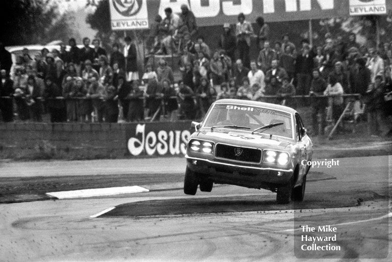 Jean-Pierre Aux on two wheels with his Mazda RX3, Britax Production Saloon Car Race, European F2 Championship meeting, Silverstone, August 31 1975.
