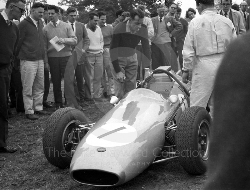 Jack Brabham, Brabham Climax, and Ron Tauranac in the paddock, Oulton Park Gold Cup 1962.
