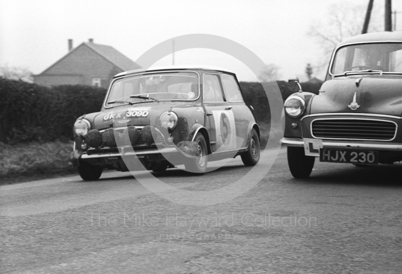 Graham Hill/Maxwell Boyd, works Mini Cooper S, reg no GRX 309D, between stages in Shropshire before retiring with broken transmission in the Lake District, RAC Rally, 1966
