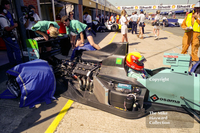 Mauricio Gugelmin, Leyton House CG901, in the pit lane at Silverstone, British Grand Prix 1990.

