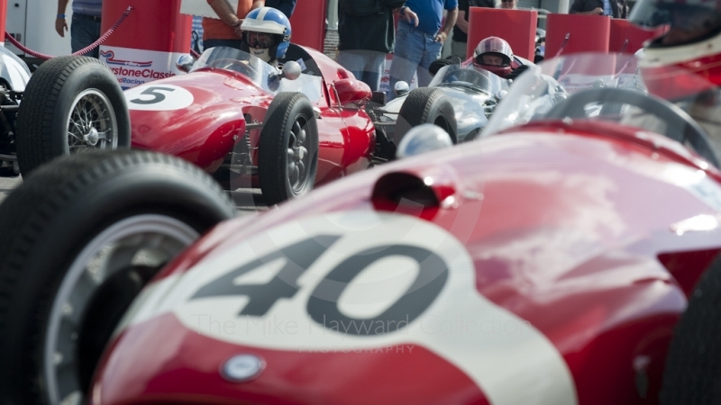 Mike Windsor-Price waits in line in his 1959 Cooper T51 in the paddock before the HGPCA pre-66 Grand Prix cars event at Silverstone Classic 2010