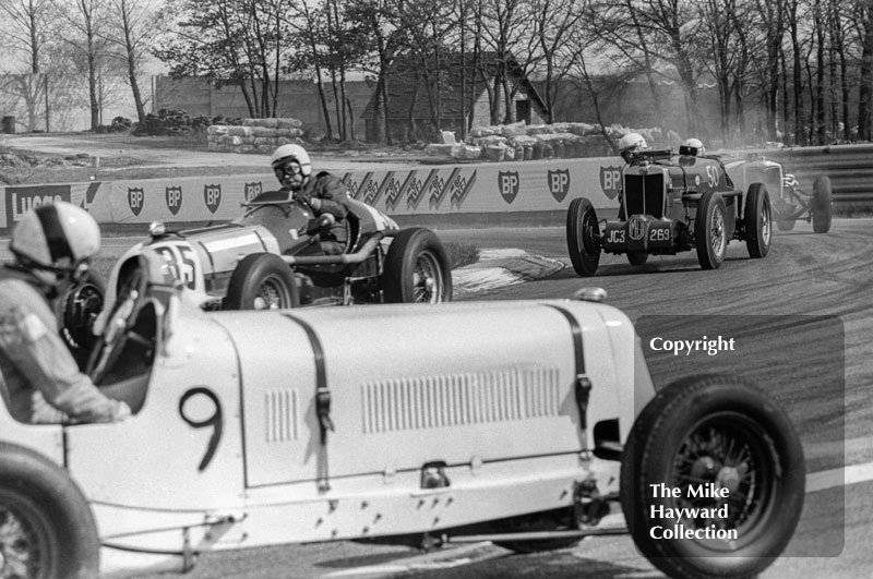 P Mann looks for gears in his ERA R9B as S Beer passes in his MG K3 Magnette, followed by C Gunn, MG Q Type Replica, VSCC Donington May 1979
