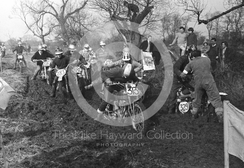 Stuck in the mud, motorcycle scramble at Spout Farm, Malinslee, Telford, Shropshire between 1962-1965