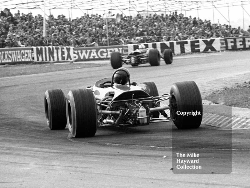 Jochen Rindt, Brabham BT23C, chases Derek Bell, Church Farm Racing Brabham BT23C, out of the chicane at the Thruxton Easter Monday F2 International, 1968.
