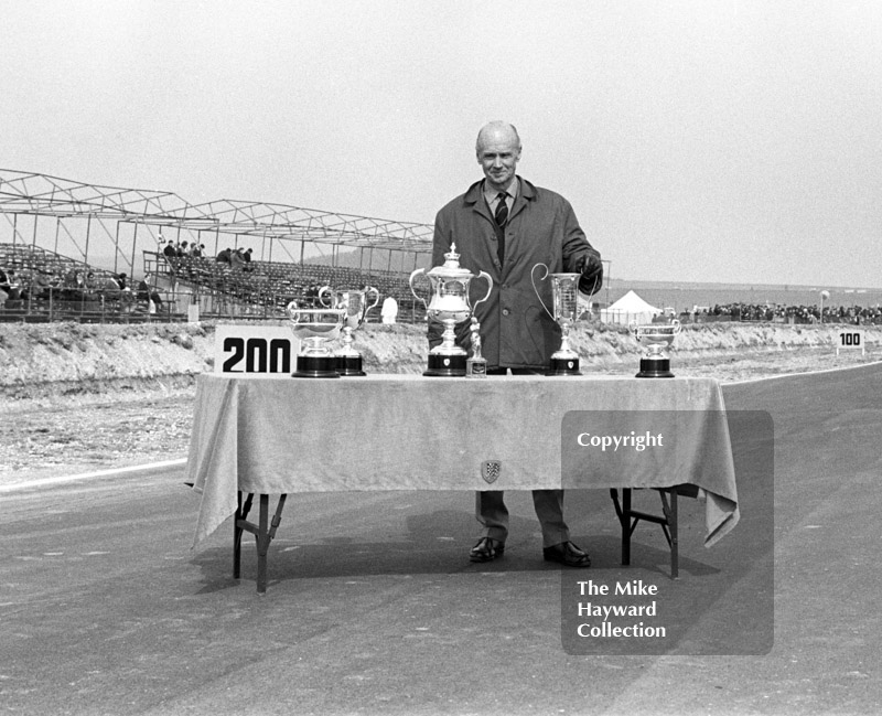 BARC president Earl Howe with the race trophies at the start of the meeting, Thruxton Easter Monday F2 International, 1968.
