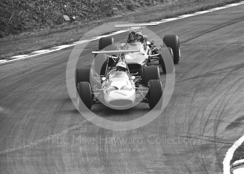 Denny Hulme, McLaren M7A/2, leads Jacky Ickx, Ferrari V12&nbsp;312 0009, at Bottom Bend, British Grand Prix, Brands Hatch, 1968.
