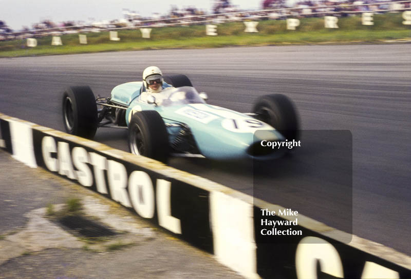 Bob Anderson, Brabham BT11, at Copse Corner, Silverstone, 1967 British Grand Prix.
