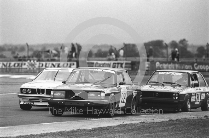 Jean-Marie Pirnay/Patrick Neve, Volvo 240 Turbo, followed by Heinz Putz/Wolfgang Kudrass, VW Golf GTI and Roberto Ravaglia/Christian Danner, BMW 635&nbsp;at Copse Corner, Istel Tourist Trophy, European Touring Car Championship, Silverstone, 1984
