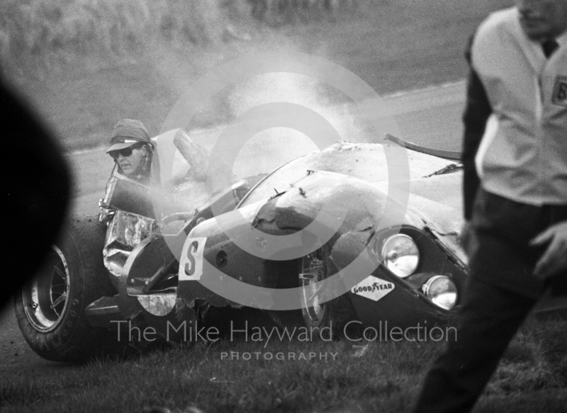 Marshalls with the wreckage of Jo Bonnier's Lola T70 which somersaulted at Bottom Bend, Brands Hatch, BOAC 500 1969.
