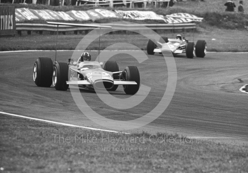 Graham Hill, Lotus Cosworth V8 49B R5, and team mate Jack&nbsp;Oliver at South Bank Bend, British Grand Prix, Brands Hatch, 1968.
