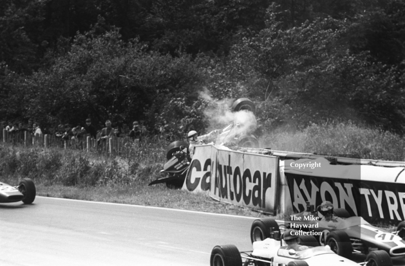 Peter Gaydon, SMRT Titan MK 3 Ford, climbs from the car after seeing what life was like from the top of an advertising sign, Mallory Park, Guards International Trophy, 1968.
