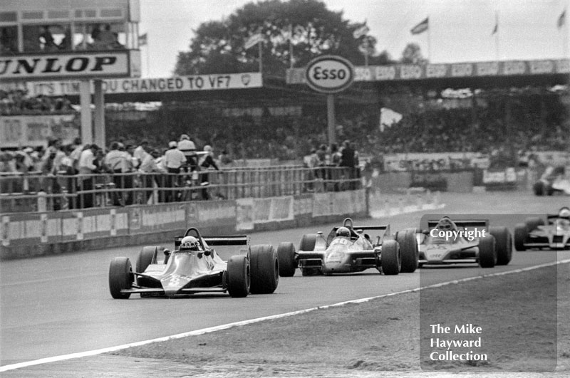Didier Pironi, Tyrrell 009, Jochen Mass, Arrows A2, Jacky Ickx, Ligier JS11, 1979 British Grand Prix, Silverstone.
