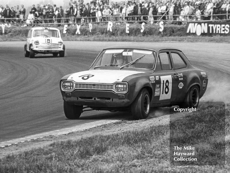 Willy Kay, Ford Escort, at Copse Corner, Silverstone Martini Trophy meeting 1970.
