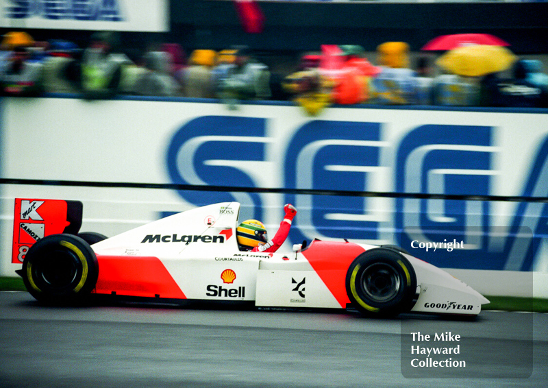 Ayrton Senna, McLaren MP4/8 crosses the line to win, Donington Park, European Grand Prix 1993.