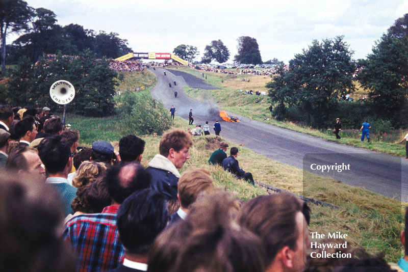 Motorcycle on fire at Knickerbrook, Oulton Park, 1963.
