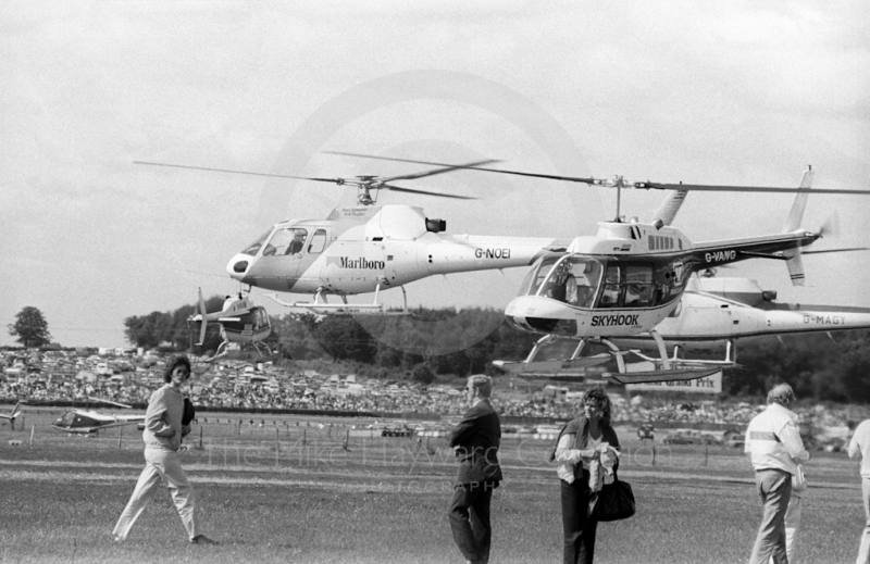 Helicopters land guests and team personnel at Silverstone, British Grand Prix 1985.
