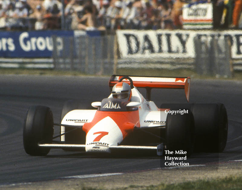 John Watson, Marlboro McLaren MP4, heading for 9th place, Copse Corner, British Grand Prix, Silverstone, 1983
