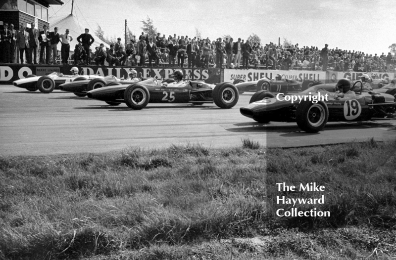 Seen from right are John Fenning,&nbsp;Brabham BT18, Roy Pike,&nbsp;Lotus 41, Piers Courage,&nbsp;Lotus 41&nbsp;and Chris Irwin,&nbsp;Brabham BT18, Silverstone International Trophy, 1966.
