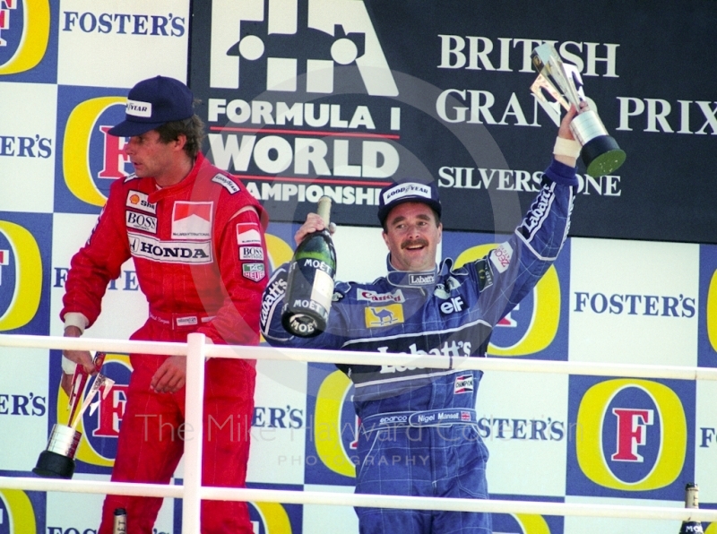 Race winner Nigel Mansell on the podium, Silverstone, British Grand Prix 1991.
