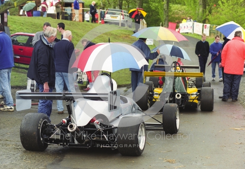 Keeping dry in the paddock queue is John Moulds, OMS 2000, Loton Park Hill Climb, April 2000.