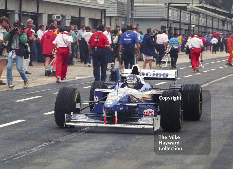 Damon Hill, Williams Renault FW18 leaves the pit lane, Silverstone, British Grand Prix 1996.
