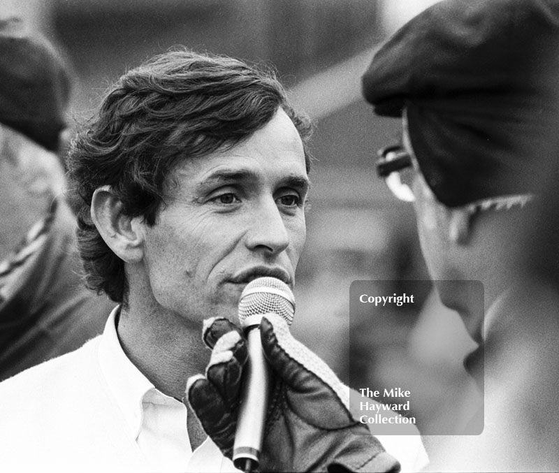 Jacky Ickx, Rothmans Porsche 956, being interviewed by Anthony Marsh on the grid, World Endurance Championship, 1985&nbsp;Grand Prix International 1000km meeting, Silverstone.
