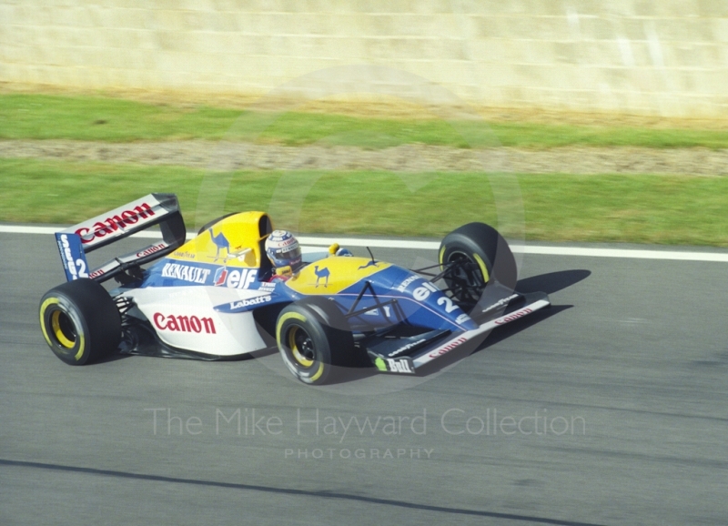 Alain Prost in a Williams Renault FW15C at Silverstone for the 1993 British Grand Prix.
