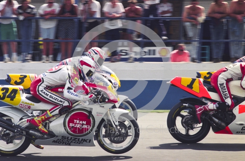 Kevin Schwantz (34), Team Lucky Strike Suzuki, and Mick Doohan (3), Rothmans Honda, Donington Park, British Grand Prix 1991.