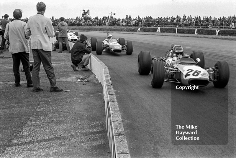 Ronnie Peterson, Vick Scandanavia Tecno 69, followed by&nbsp;Reine Wisell, Chevron B15, and Tetsu Ikuzawa, Lotus 59, Silverstone, British Grand Prix meeting 1969.
