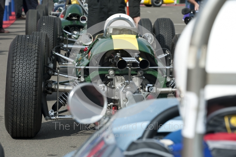 Nick Fennell queues for practice in his 1962 Lotus 25 in the paddock before the HGPCA pre-66 Grand Prix cars event at Silverstone Classic 2010