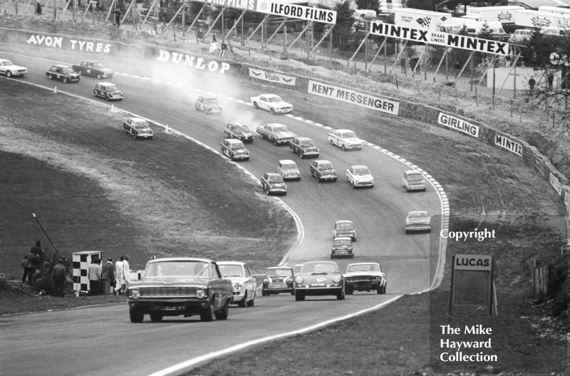 Frank Gardner, Alan Mann Ford Falcon, leads up Pilgrims Rise on the first lap, Lombank Trophy Saloon Car Race, Race of Champions meeting, Brands Hatch 1967.
