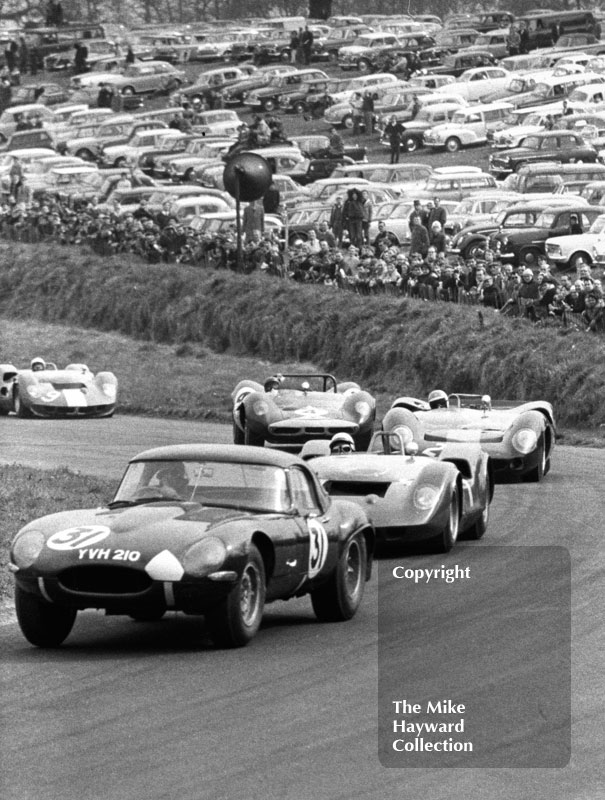 Richard Bond, E type Jaguar (YVH 210), leads John Coundley, McLaren Oldsmobile, David Hobbs, Harold Young Lola 70, Jim Clark, Lotus 30 and Bruce McLaren, McLaren Oldsmobile, Tourist Trophy, Oulton Park. 1965
