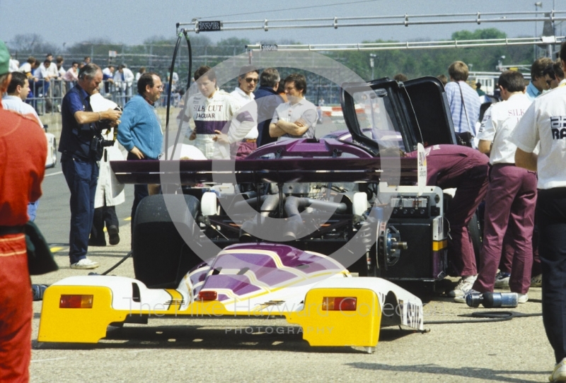 Martin Brundle and a Silk Cut Jaguar XJR-9 in the pits, Silverstone 1000km FIA World Sports-Prototype Championship (round 4).
