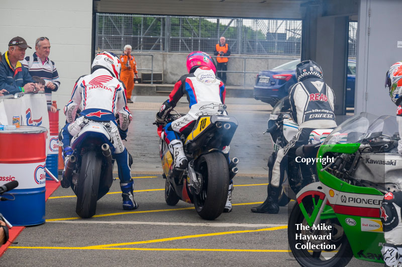 World Grand Prix Bike Legends exiting the paddock, 2016 Silverstone Classic,
