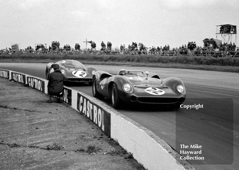 Hugh Dibley, Lola T70, leads David Piper's Ferrari 365 P2 at Copse Corner,Silverstone International Trophy sports car race, 1966
