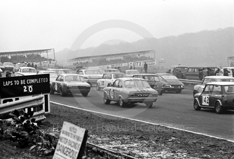Rob Mason, Don Moore Mini Cooper S, and Roger Taylor, Ford Escort (XTM 378F) Twin Cam, bring up the rear on the first lap, Brands Hatch, Race of Champions meeting 1969.
