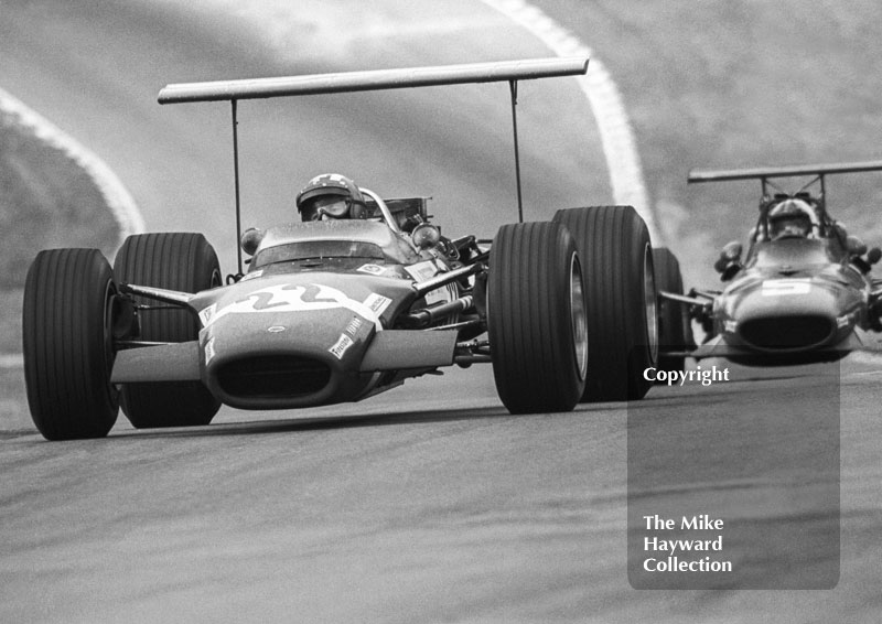 Race winner Jo Siffert, Rob Walker Lotus 49, leads Chris Amon, Ferrari 312 V12, into Druids Hairpin during their long duel for the lead at Brands Hatch, 1968 British Grand Prix.
