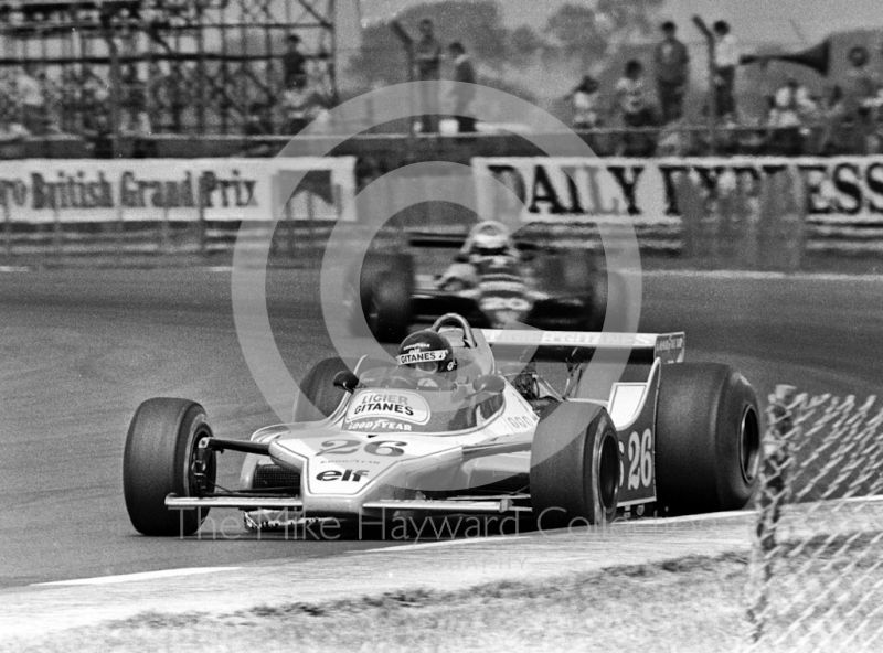 Jacques Laffite, Ligier JS11, followed by Keke Rosberg, Wolf WR7,&nbsp;at Copse Corner, Silverstone, British Grand Prix 1979.
