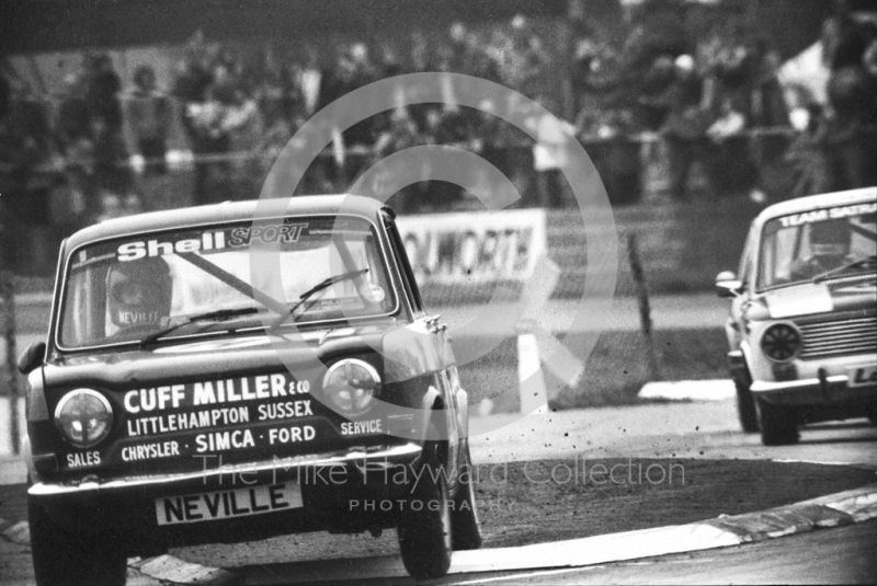 Simca Rallye bounces over Woodcote chicane, Britax Production Saloon Car Race, European F2 Championship meeting, Silverstone 1975.
