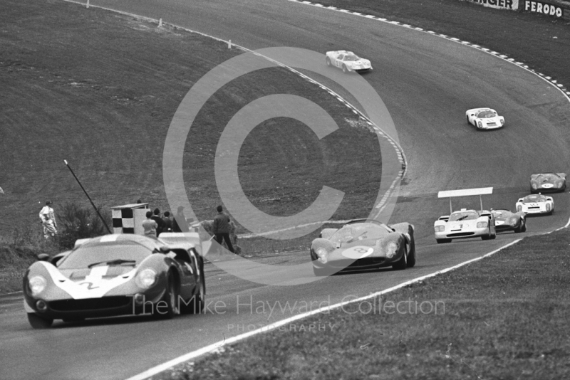 John Surtees/David Hobbs, Lola T70 Mk3; Jonathan Williams/Paul Hawkins, Ferrari 330P4; and Phil Hill/Mike Spence, Chaparral 2F, Brands Hatch, BOAC 500 1967.
