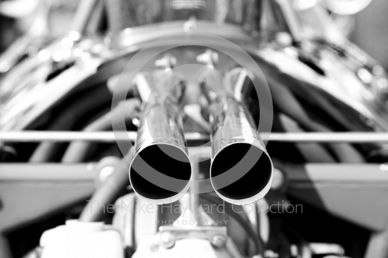 Black and white study of Lotus exhaust pipes, Silverstone Classic 2010
